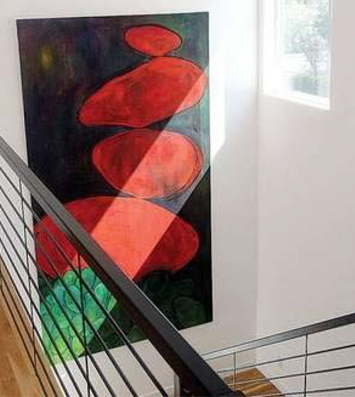 Rika Turel, a painter, designed her home to display her large canvasses.